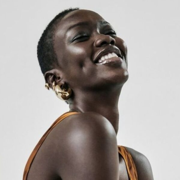 photo of a beautiful black woman with glowing skin - Fashion Police Nigeria