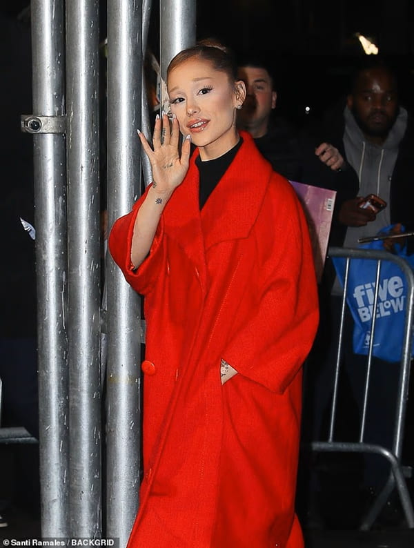 Ariana Grande Oozes Sophistication in a Festive Red and Black Outfit Combo - Fashion Police Nigeria