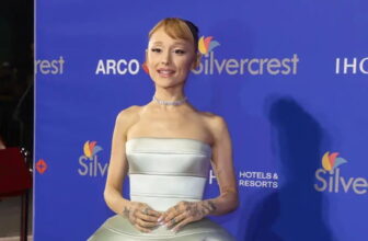 Ariana Grande Oozes Sophistication in a Festive Red and Black Outfit Combo - Fashion Police Nigeria