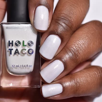 The Holiday Nail Polish Shades Everyone Is Wearing Holotaco milky white shimmer nail polish - Fashion Police Nigeria