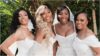 Venus and Serena Williams posing in a white wedding gowns during her marriage to Andrea Preti - Fashion Police Nigeria