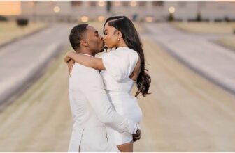 Photo of a newly wedded married African American couple kissing outside wedding hall - Fashion Police Nigeria