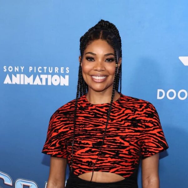 Gabrielle Union Twins with Her Daughter Kaavia in Animal Print Dress