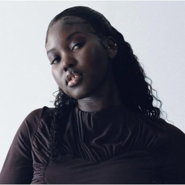 Photo of Adut Akech caressing her baby bump for her second child - Fashion Police Nigeria