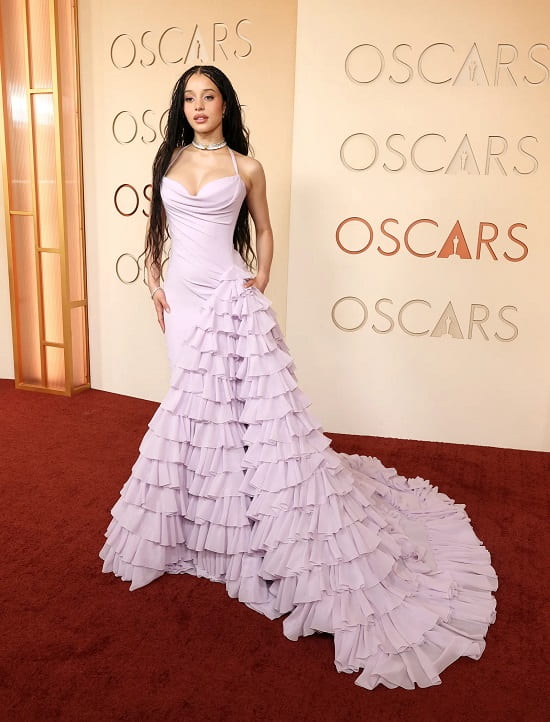 Chase Infiniti’s Oscars 2026 Lavender Gown Took Over 750 Hours to Make