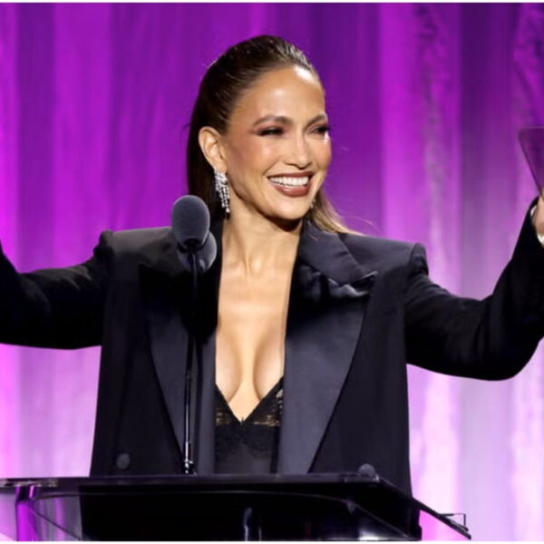 Jennifer Lopez Wore an Oversized Blazer Over a Plunging Lace Slip Dress