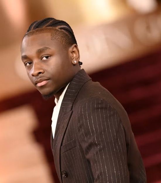 Miles Caton wears clean braids at the 2026 Golden Globes