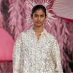 Photo of Bhavitha Mandava walking the runway during fashion week show