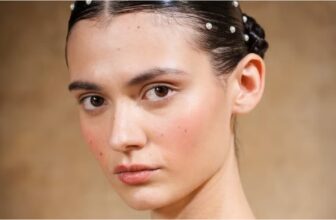 Photo of a model wearing a watercolour makeup