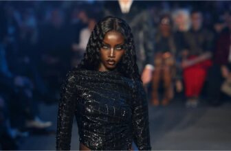 Supermodel Anok Yai walks the runway during Gucci Cruise 2027 show at New York's Times Square