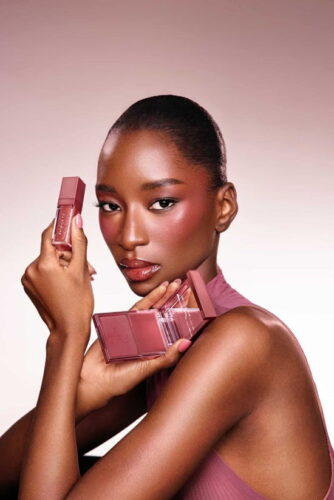photo of a lady holding a blush