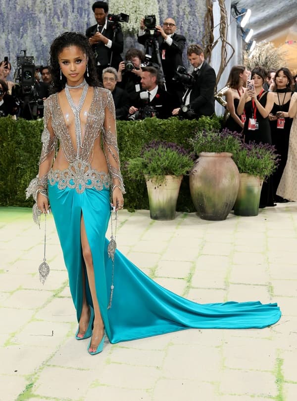Tyla Stuns at 2026 Met Gala in Plunging Valentino Peacock Gown Tyla Stuns at 2026 Met Gala in Plunging Valentino Peacock Gown