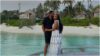 photo of a couple on their honeymoon