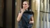 Celine Dion Sings and Dances with Fans Outside Paris Hotel in Stunning Black Gown