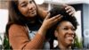 photo of a lady getting her hair done