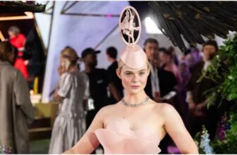 Elle Fanning Channels Balletcore Magic in a Music Box Headpiece at London's Hunger Games Screening