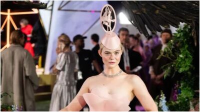 Elle Fanning Channels Balletcore Magic in a Music Box Headpiece at London's Hunger Games Screening