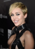 They’re almost naked! Miley Cyrus and Rihanna leave little to the imagination in barely-there frocks