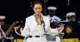 Rihanna Wows In White Mini Dress and Blazer As She’s Honored The Barbados National Hero