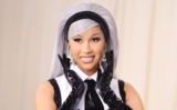 Cardi B’s 2023 Met Gala Look: A Tribute to Karl Lagerfeld in a Bold Black Ball Gown and Tie