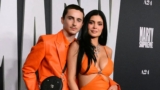 Kylie Jenner Twin With Boyfriend Timothée Chalamet in Matching Bright Orange Outfits
