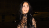 Kim Kardashian Puts Her Body on Display in a See-Through Lace Catsuit