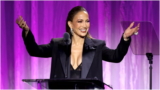 Jennifer Lopez Wore an Oversized Blazer Over a Plunging Slip Dress