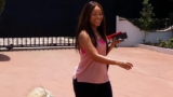Joselyn Dumas Walks Her Adorable Dog Wearing A Pink Tank Top