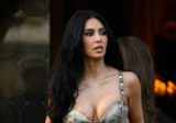 Kim Kardashian Looks Glamorous in a Skin-Hugging Snakeskin Dress in Venice