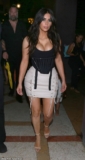 Kim Kardashian Tests Out Her Famous Figure In Eye-Catching Miniskirt And Corset Top