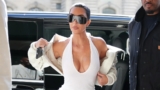 Kim Kardashian Stuns in Plunging White Dress in Paris After Romantic Date Night with Lewis Hamilton