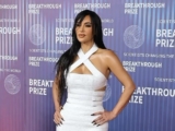 Kim Kardashian is Ethereal in a White Leather Gown and Wet Hair Look