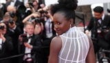 Lupita Nyong’o Dazzles In White Feathered Gown At Cannes Film Festival