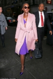 Lupita Nyong’o Puts Her Toned Tummy on Display In A Color Pop Dress