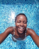 Lupita Nyong’o Embraces Long Braids For Summer