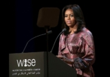 See How Michelle Obama Made The Silk Maxi Dress A Business Appropriate