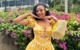 Nancy Isime Takes Jamaica in a Frilly Bright Yellow Mini Dress