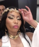Nicki Minaj Looks Like A Roman Goddess Dripping In Gold Accessories