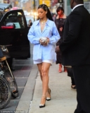 Rihanna Has A Flattering Cool Way To Wear An Oversized Shirt
