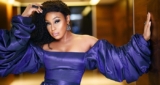 Rita Dominic Wore a Juicy Tiffany Amber Dress With Jaw-Dropping, Billowing Sleeves