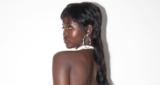 Model Adut Akech Leaves Little To The imagination In A Skimpy White Dress
