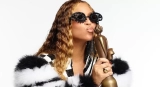 Beyonce Shows Off Her Brits Awards In Monochrome Outfit