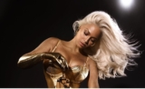 Beyonce Drapes in a Little Gold Bustier Because “Love is the only Gold”