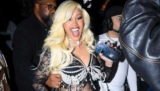 Cardi B Puts Her Growing Baby Bump on Display in a See-Through Catsuit