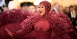 Cardi B Stuns in Red Feather Met Gala Gown