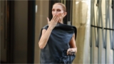 Celine Dion Sings and Dances with Fans Outside Paris Hotel in Elegant Black Gown
