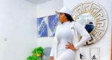 Chika Ike Looks Chic in an All-White Look with Purple Accessories