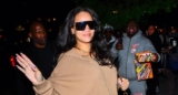 Rihanna Bares Her Baby Bump in a Crop Top and Sweatpants For a Chic Travel Style