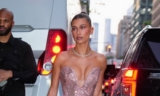 Hailey Bieber Embodies Femme Fatale in a Bejeweled Pink Micro Dress
