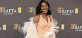 Ayo Edebiri Exudes Style in a Peach Gown and Feather Shawl at the 2024 BAFTA Awards